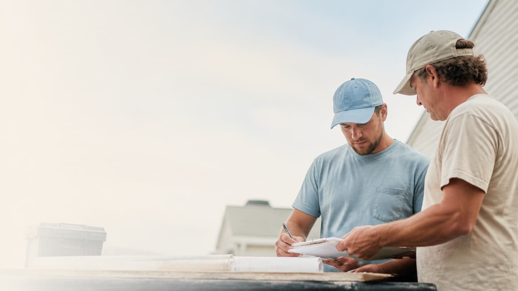 Abstract layered scene of a contractor handing paperwork to a project site, soft warm gradients, glassmorphism overlay