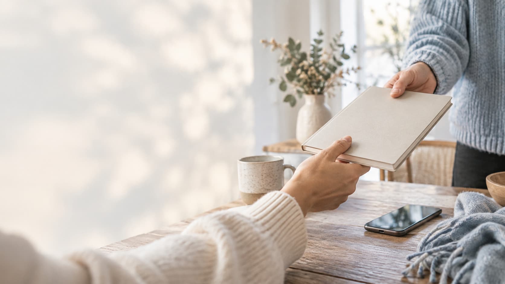Service business owner reviewing contracts at a desk before winter season