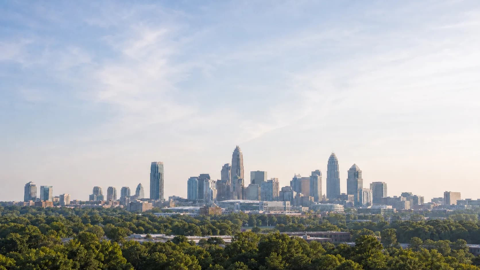 The Charlotte, North Carolina skyline rising above the tree canopy